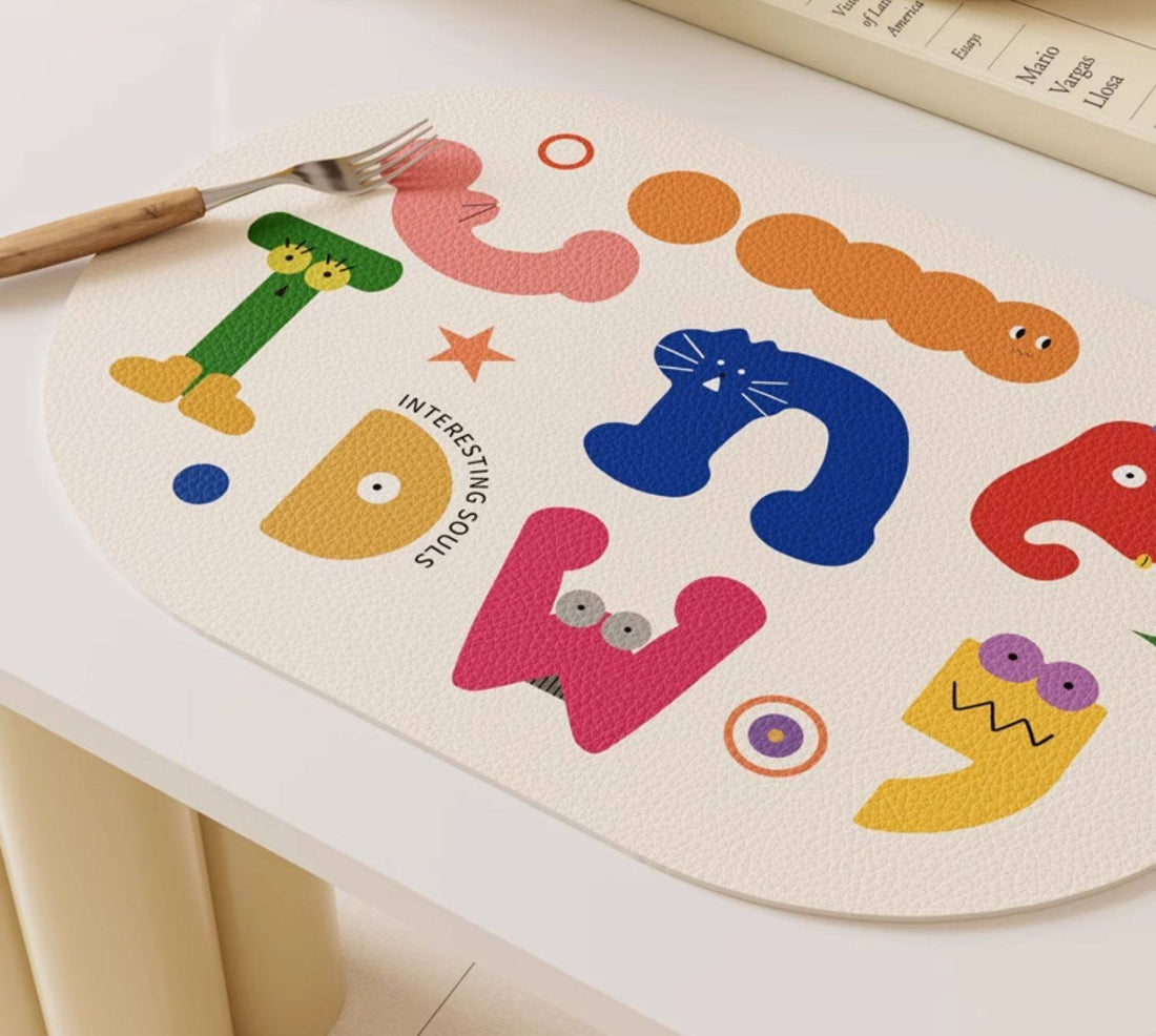 “Doodle Monsters" Waterproof PVC Leather Pet Feeding Mat